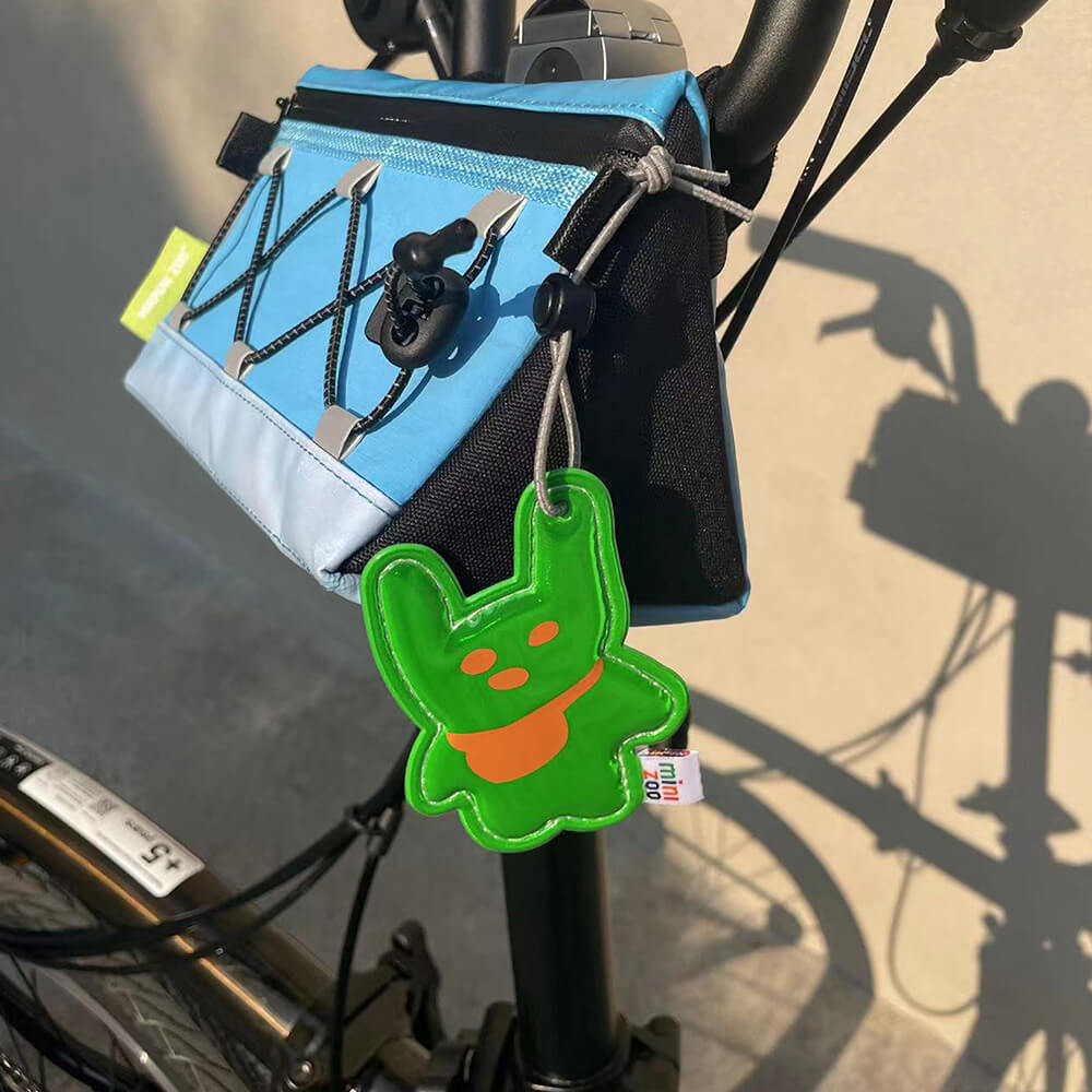 Green-Bunny-Shaped-Design-Reflective-Charm-Attached-On-Bike-Bag