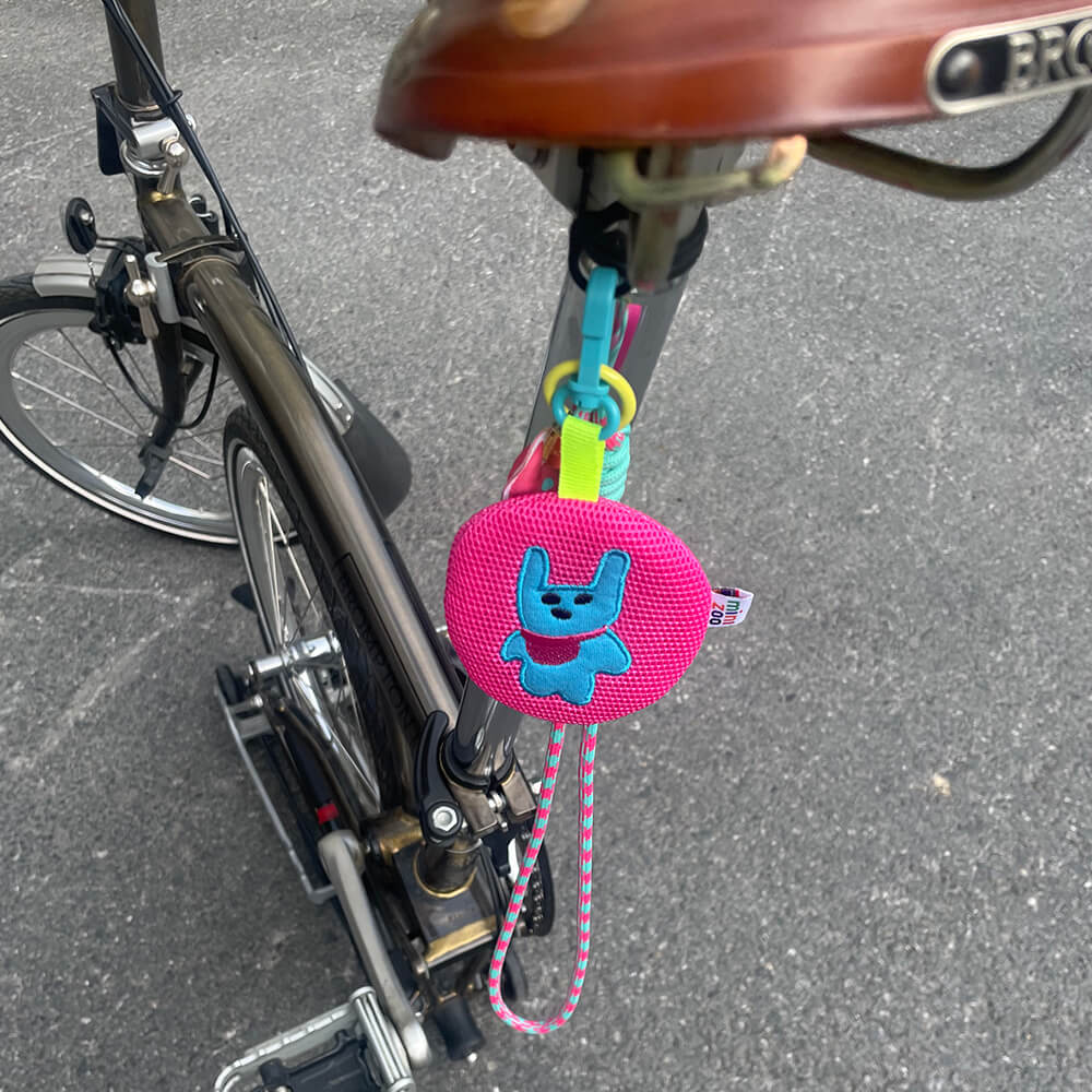 Pink-KEKETOO-Bunny-Mosquito-Repellent-Pendant-Hanging-On-Brompton-Bike-Saddle