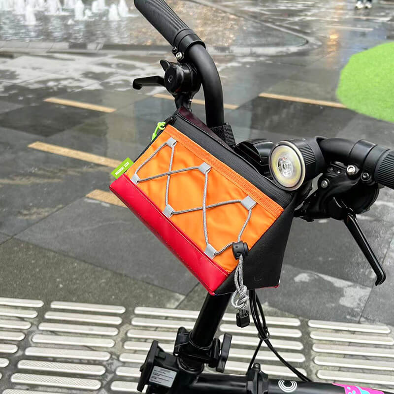 Vibrant-Orange-Upcycled-Billboard-And-Eco-Friendly-RPET-Triangle-Shaped-Bike-Handlebar-Bag